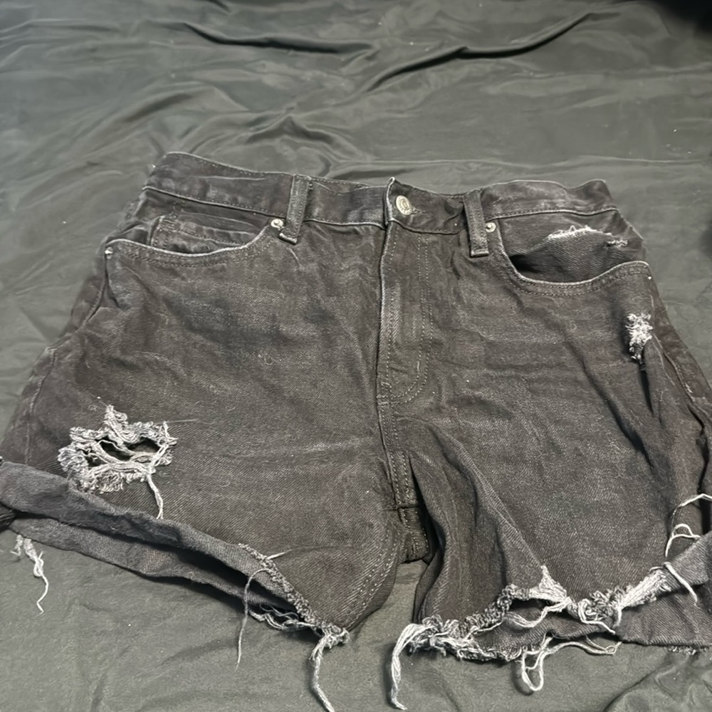 Black ripped shorts